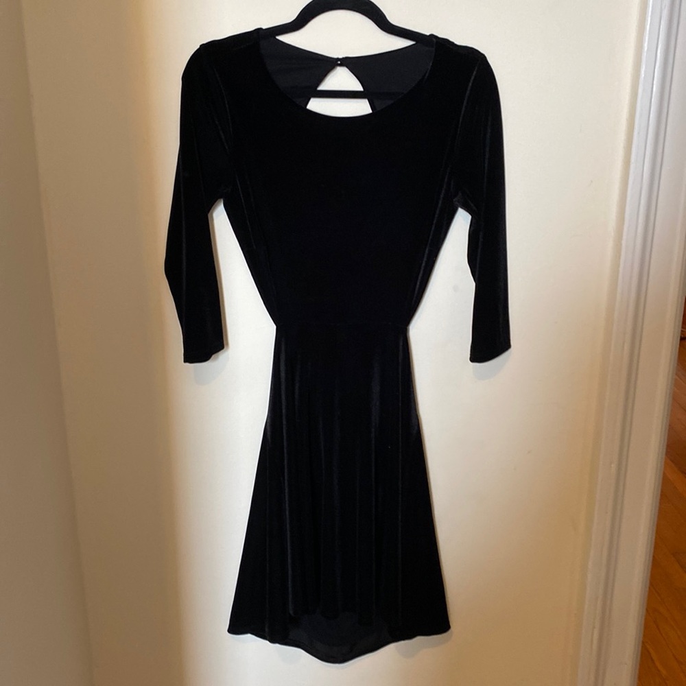 Black velvet backless skater dress with long sleeves